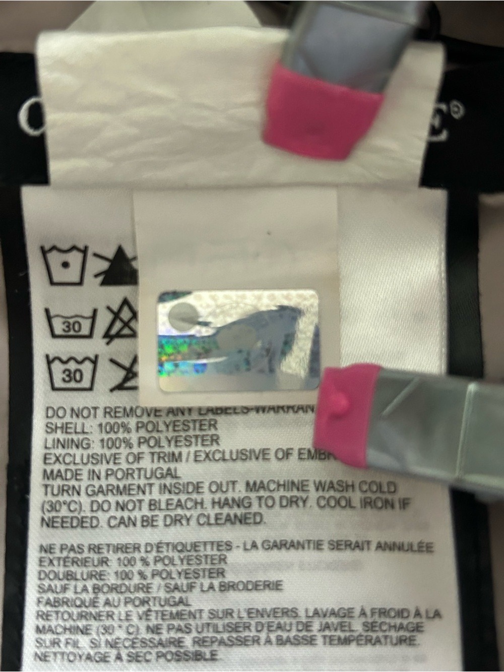 Canada Goose White Care Label with Red Tab Accents with small marks on sleeve. - Picture 2 of 7
